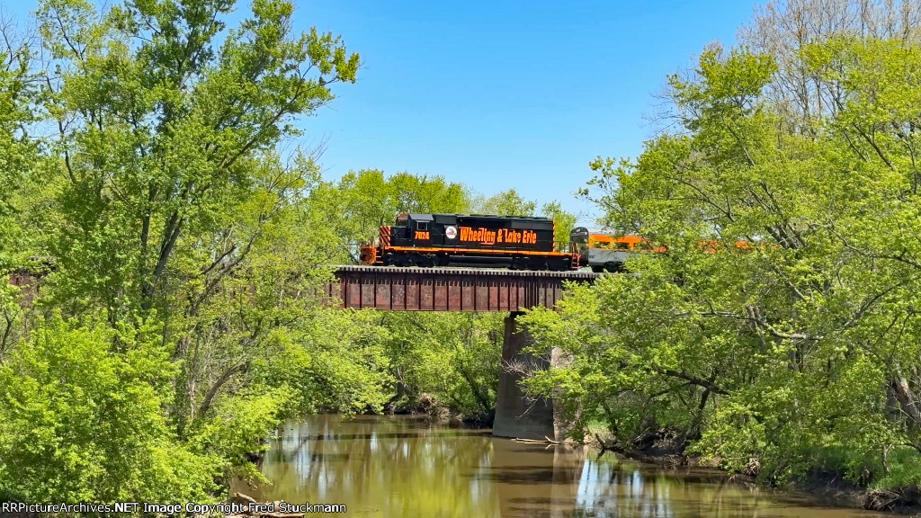 WE 7024 crosses the Tuscarawas River.